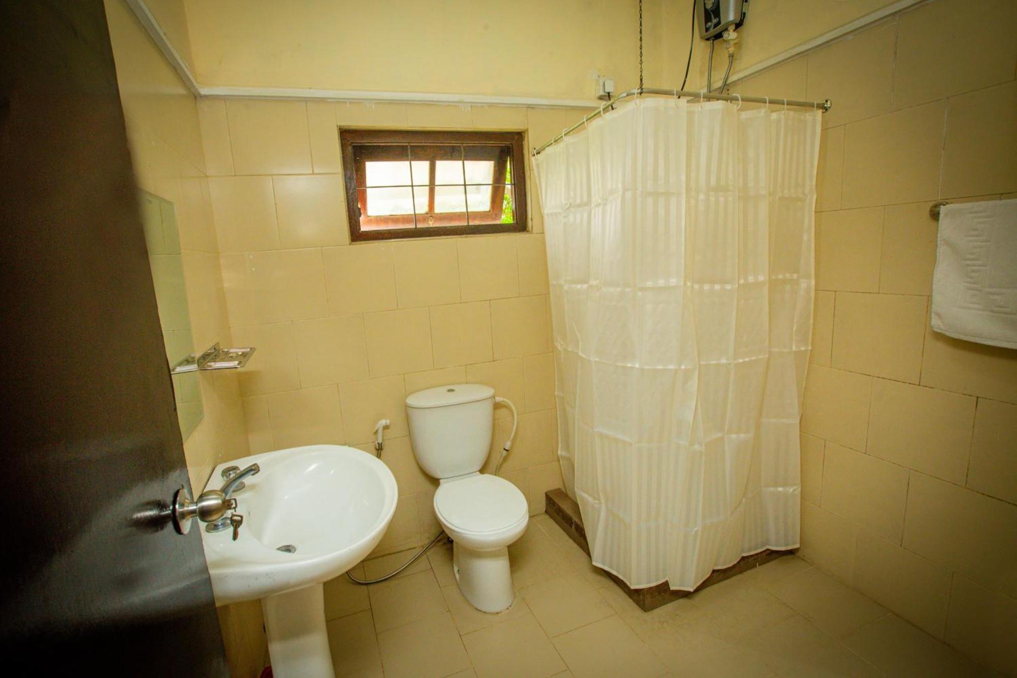 Sunbloom Inn Канди Екстериор снимка